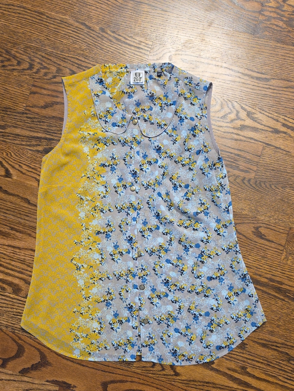 CAbi Yellow and Blue Floral Sleeveless Button-Up Blouse